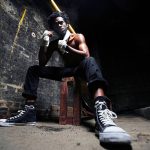 street fighter resting on bench.